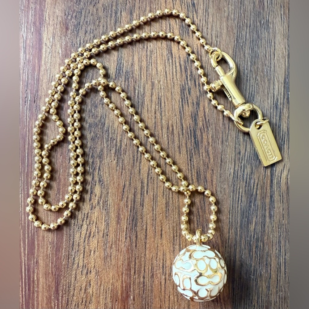 Coach Gold and Cream Pendant Necklace